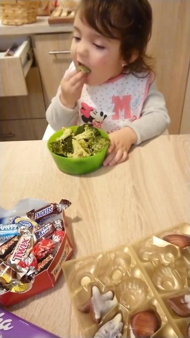 Little Girl Chooses to eat Broccoli Over Chocolates and Candies by c_prompt channel
