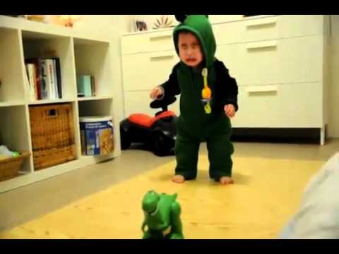Baby is scared of a dinosaur, but keeps going back for more by c_prompt channel
